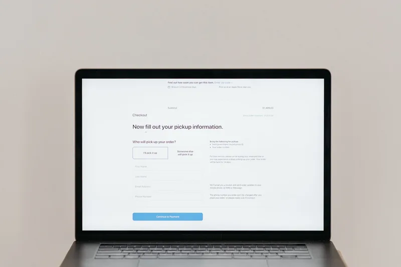 Online checkout form displayed on a laptop screen showing a smooth payment flow